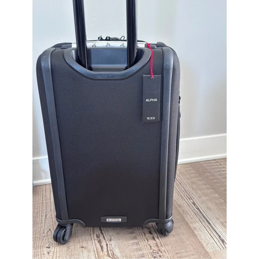 Tumi Black Upright Carry-On Spinner with Front Pockets Dual Access 4 Wheeled 🏖️